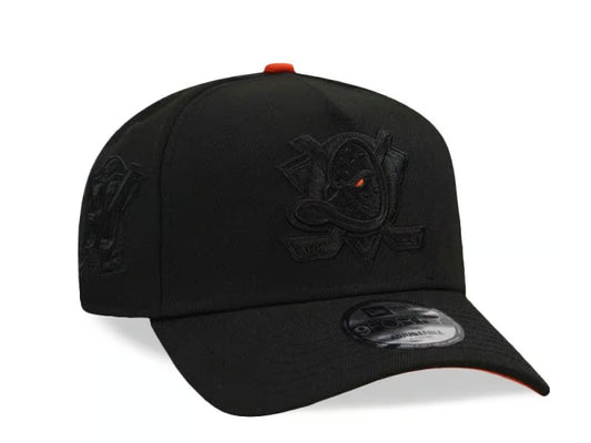 Gorra Anaheim Ducks 30th Anniversary Blackout Orange Pop Prime Edition 9Forty A Frame